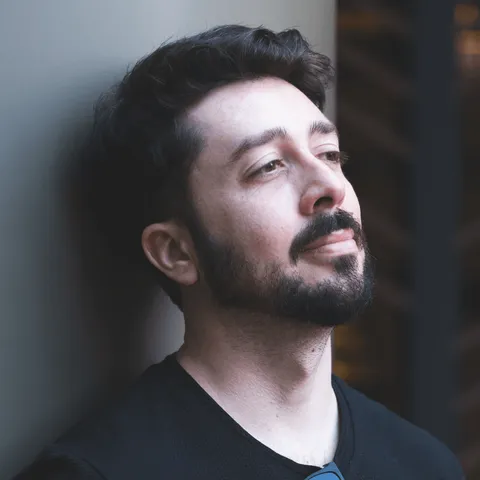 Eder Christian, side-lit portrait, looking up and away from the camera